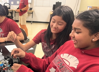 Students enjoying FCS's new robotics program.